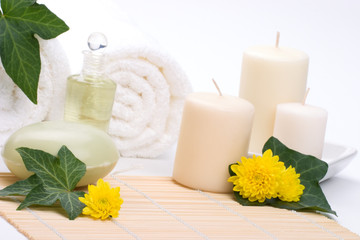 Obraz na płótnie Canvas Spa set - Chrysanthemums, aroma candles, oils, soap