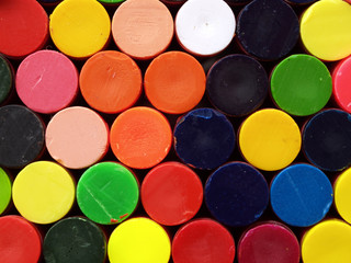 Wax crayons photographed end on as a background
