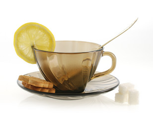 empty glass transparent cup, spoon, suggar and lemon
