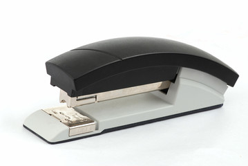 Paper stapler macro isolated on the white background