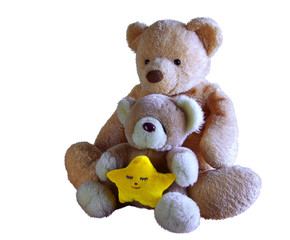 Two teddybears with yellow star isolated in white
