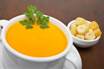 Carrots puree with parsley and bread croutons. Shallow DOF
