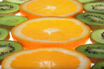 Orange and kiwi slices background