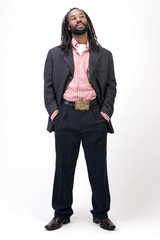 A black man with dreadlock hair isolated on a white background.