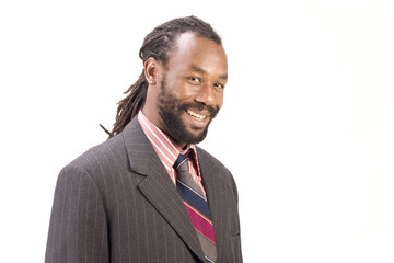 A black man with dreadlock hair isolated on a white background.