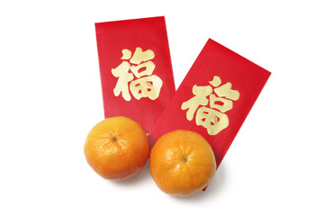 Chinese New Year Red Packets and Mandarins on White Background
