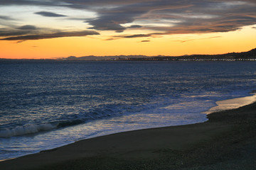 Obraz premium Sunset by the Mediterranean sea in Nice, French Riviera.