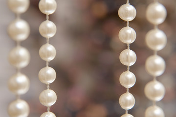 Silver stars chain on a glittering background