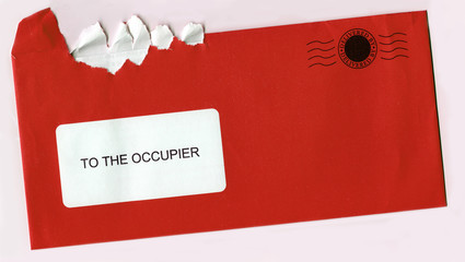 Torn Open Envelope With Post Stamp - Red Letter day concept