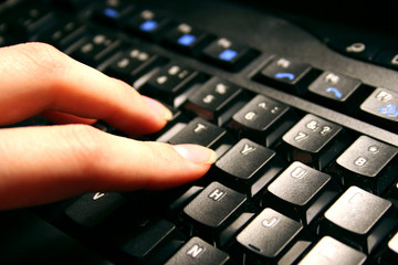 hand on the keyboard