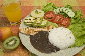 Plate of rice, beens and chicken
