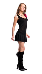 Young slim woman in black dress. Isolated on white.