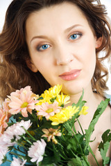 Fototapeta premium Portrait gorgeous women with flowers. Close-up.