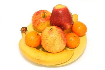 Tasty, ripe, large fruit on a yellow plate