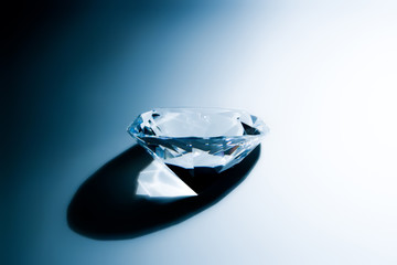Diamond on grey-blue bg - obrazy, fototapety, plakaty