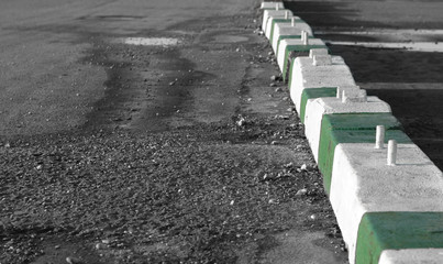 concrete diversion barriers in parking lot - 5698755