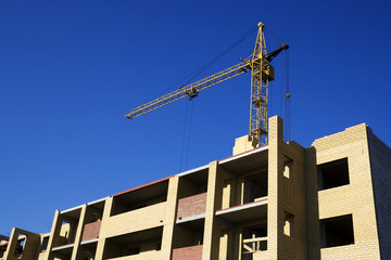 Naklejka premium The crane and construction.
