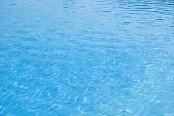 Blue water texture. Swimming pool view