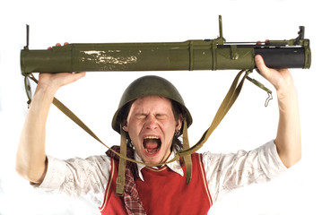 Man on the white background with rocketlauncher. 