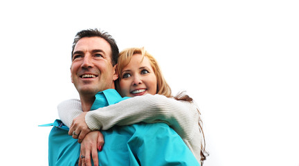 Fototapeta premium happy couple is smiling against white background