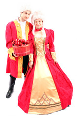 royal queen and king in masquerade ball attire with red