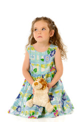 The child with a toy dog