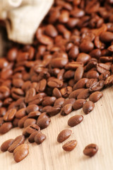some coffee beans and a jute bag