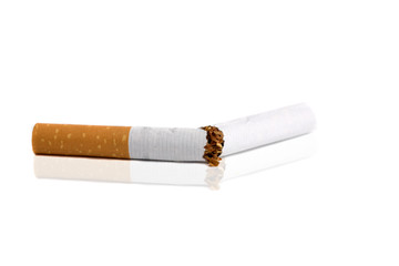 A cigarette broken in two for quitting smoking