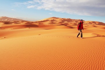 Fototapeta na wymiar Man observer sand desert