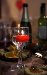 wine glass with water and light on the table