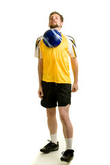 A male soccer player. Studio shot over white.