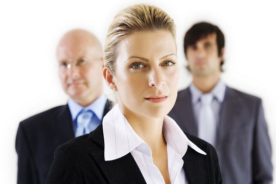 Three Business People Against A White Background