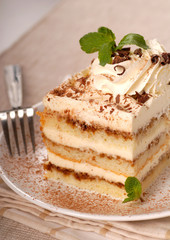 Creamy Tiramisu with cocoa powder and mint