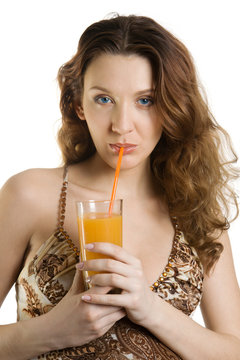 Attractive brunette drink orange juice. Isolate on white.