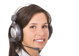 Beautiful smilling brunette with headphones.