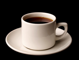 Cup of coffee isolated over black background