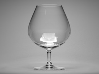 Empty glass on a grey background