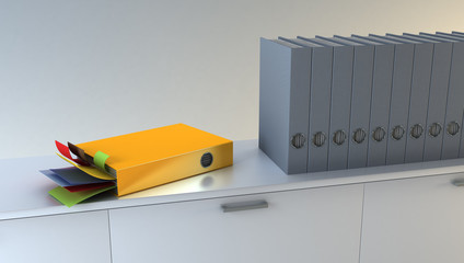 exclusive orange folderwith stickers among row of folders