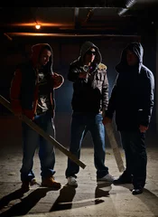 Foto op Aluminium Gang members in a dark alley © Ljupco Smokovski