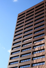 Fototapeta na wymiar Brown Brick Skyscraper