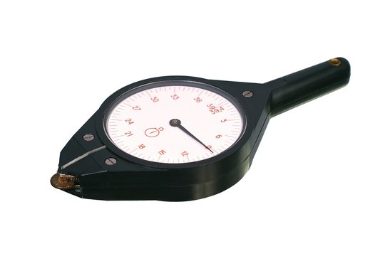 Old plastic curvimeter. Isolated image on white background.