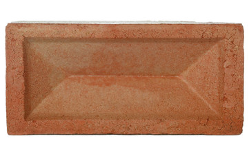 Red brick against a white background.