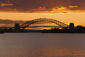 Golden sunset Sydney Harbor ( Harbour ) Bridge