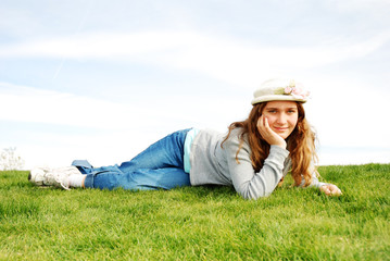 young girl is enjoying herself at outdoor location