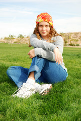 young girl is enjoying herself at outdoor location