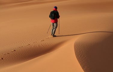 Man observer  sand desert