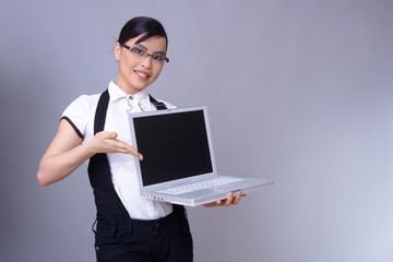 Beautiful brunette business woman with laptop computer