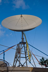 broadbrand satelite dish on  blue sky background