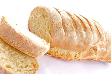 Close up of a Sliced toast and fresh bread .