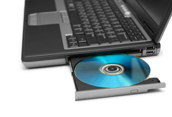 Laptop and cd drive isolated on the white